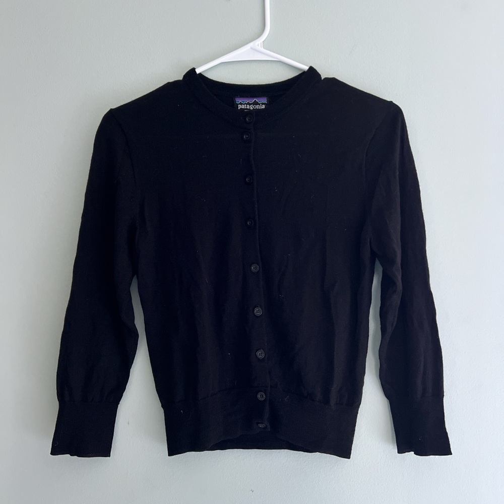 Patagonia Women’s size small 100% merino wool black button up cardigan sweater